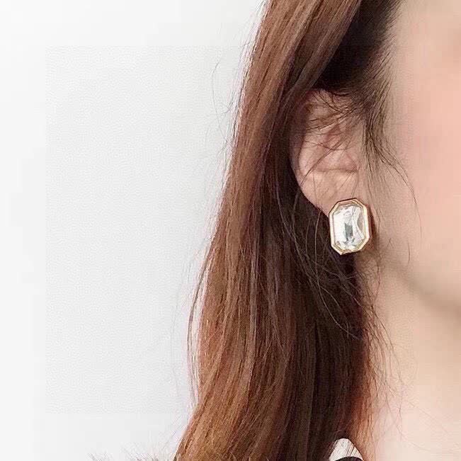 Balenciaga Elegant Gold-Plated Stud Earrings with Clear Crystal