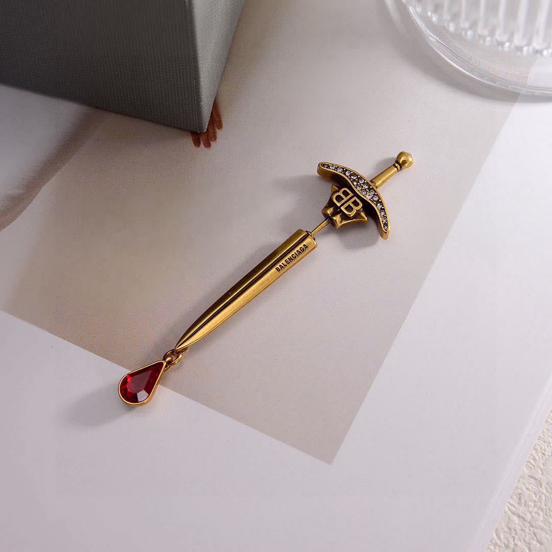 Balenciaga Sword Earrings with Red Gemstone