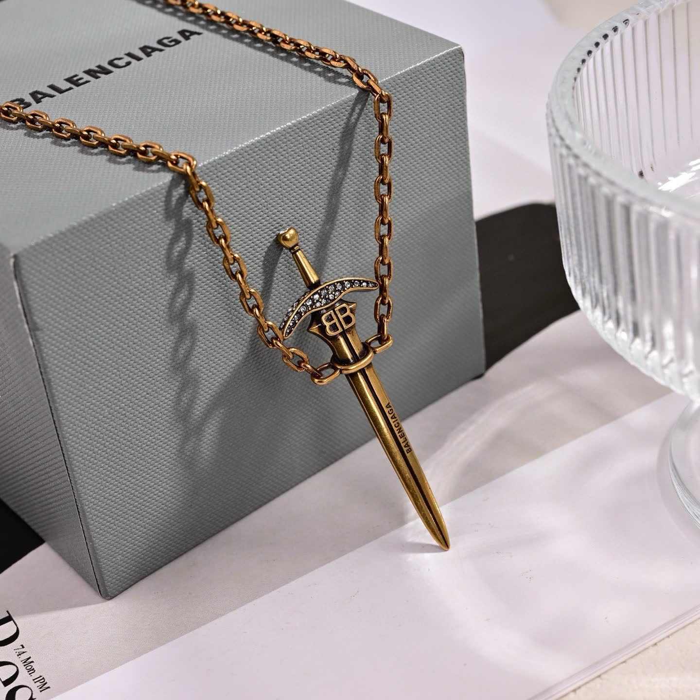 Balenciaga Sword Earrings with Red Gemstone