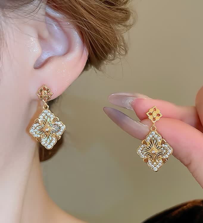 Buccellati Elegant Gold-Tone Filigree Drop Earrings with Crystal Accents