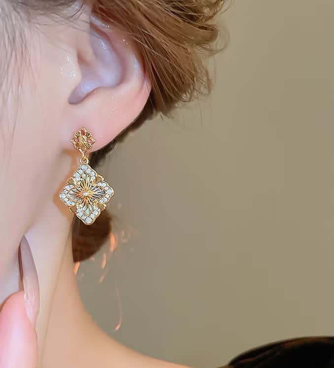 Buccellati Elegant Gold-Tone Filigree Drop Earrings with Crystal Accents