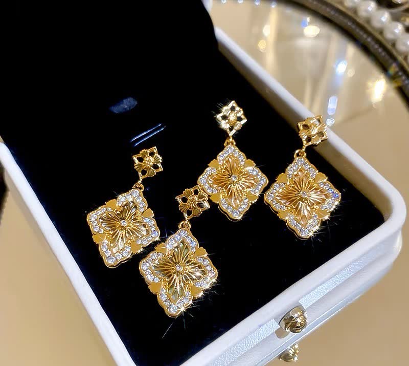 Buccellati Elegant Gold-Tone Filigree Drop Earrings with Crystal Accents