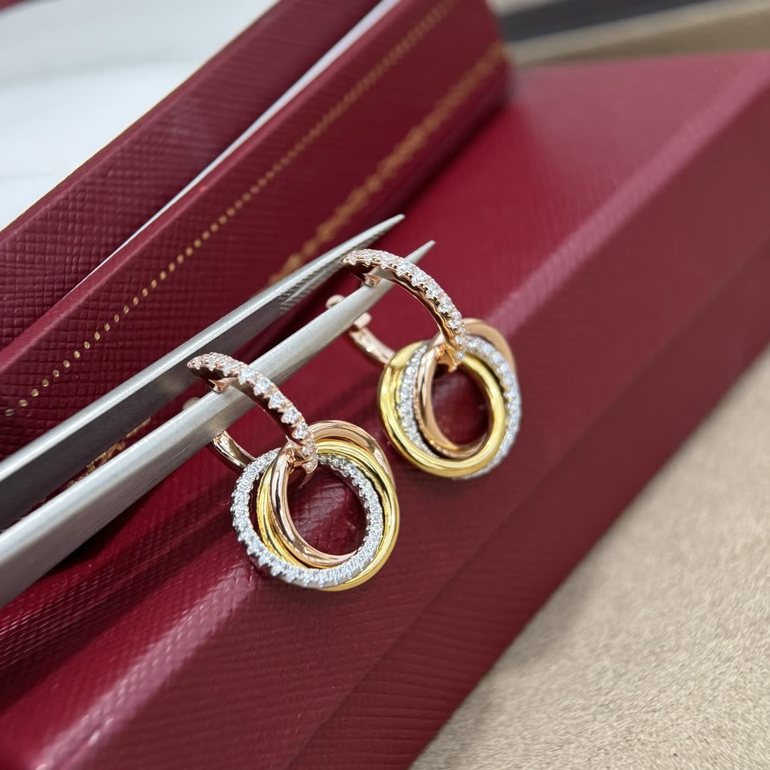 Cartier Elegant Gold and Diamond Hoop Earrings