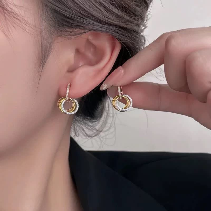 Cartier Elegant Gold and Diamond Hoop Earrings