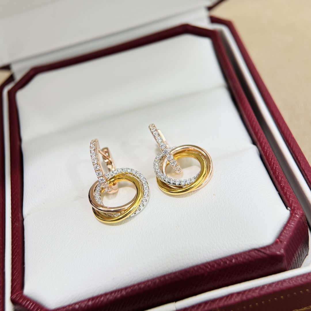 Cartier Elegant Gold and Diamond Hoop Earrings