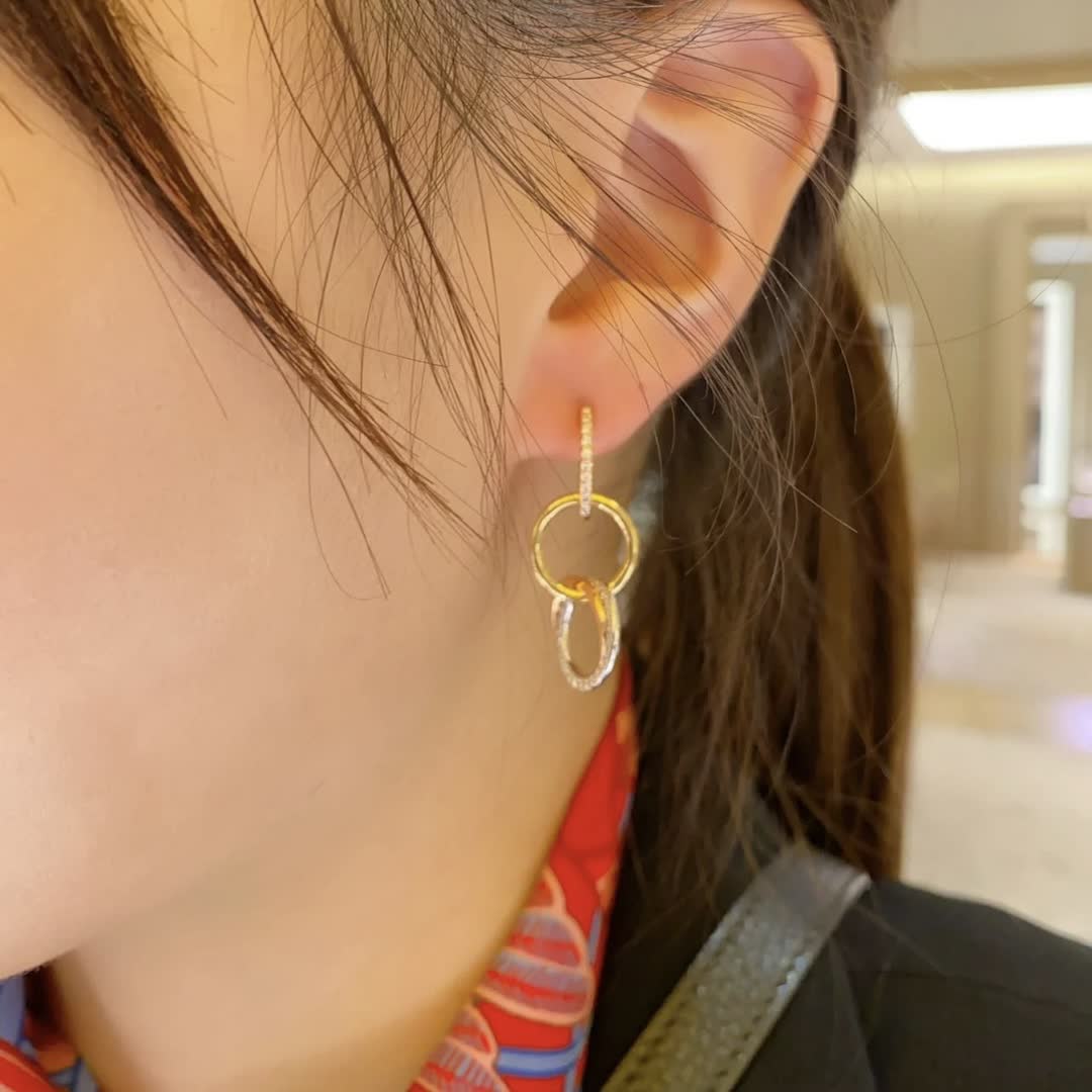 Cartier Elegant Gold and Diamond Hoop Earrings