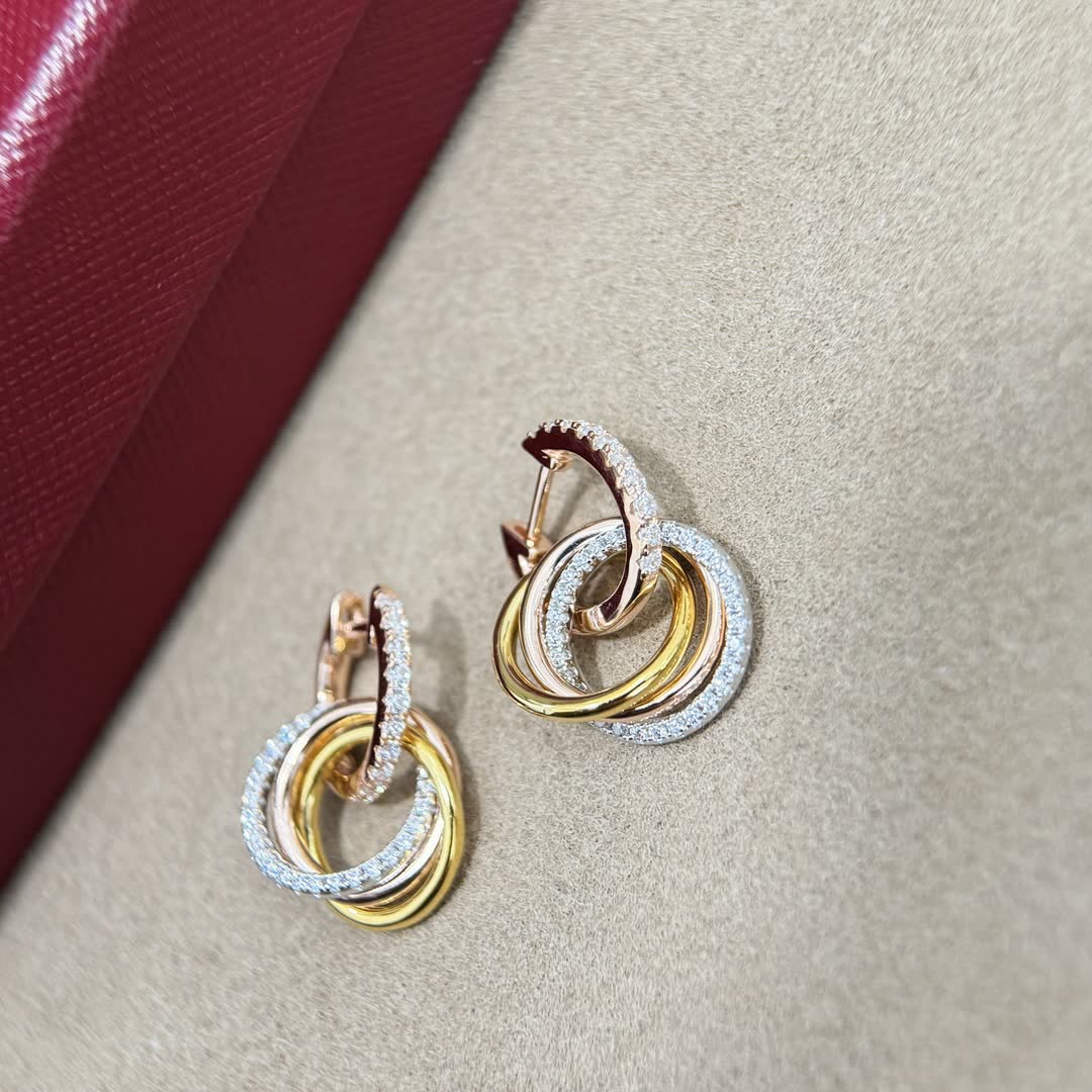 Cartier Elegant Gold and Diamond Hoop Earrings