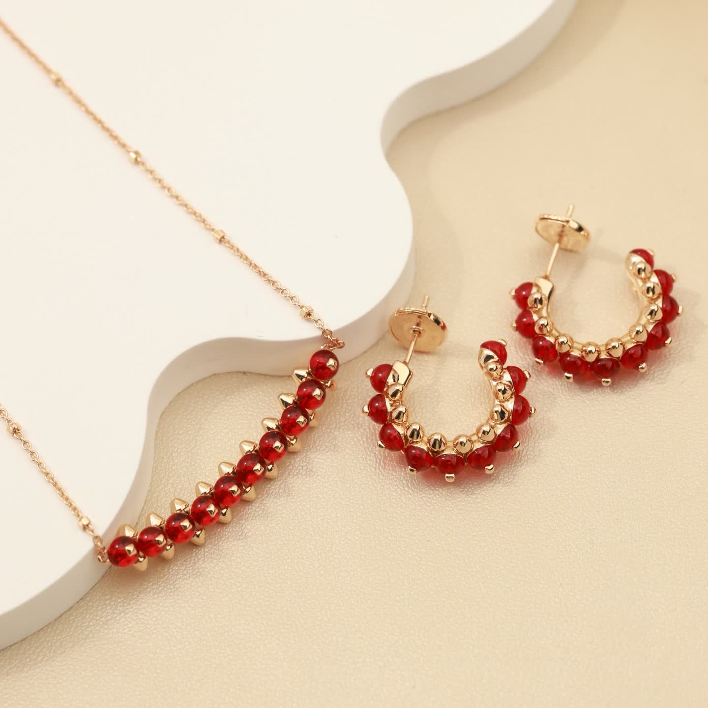 Cartier Elegant Beaded Hoop Earrings Set