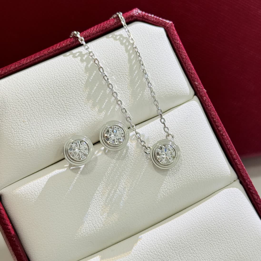 Cartier Elegant Silver Diamond Stud Earrings and Pendant Set