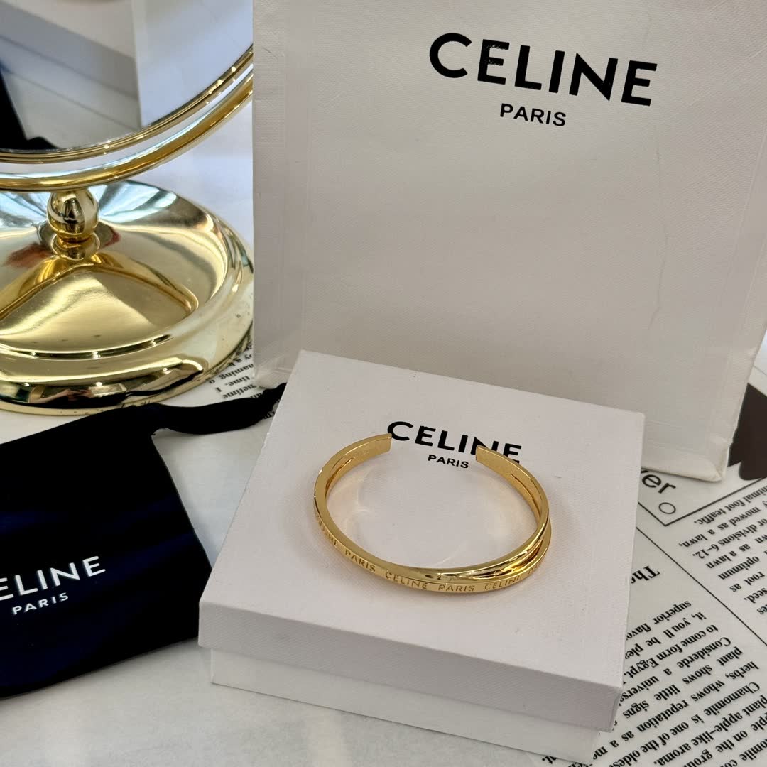 Celine Gold Tone Engraved Bracelet