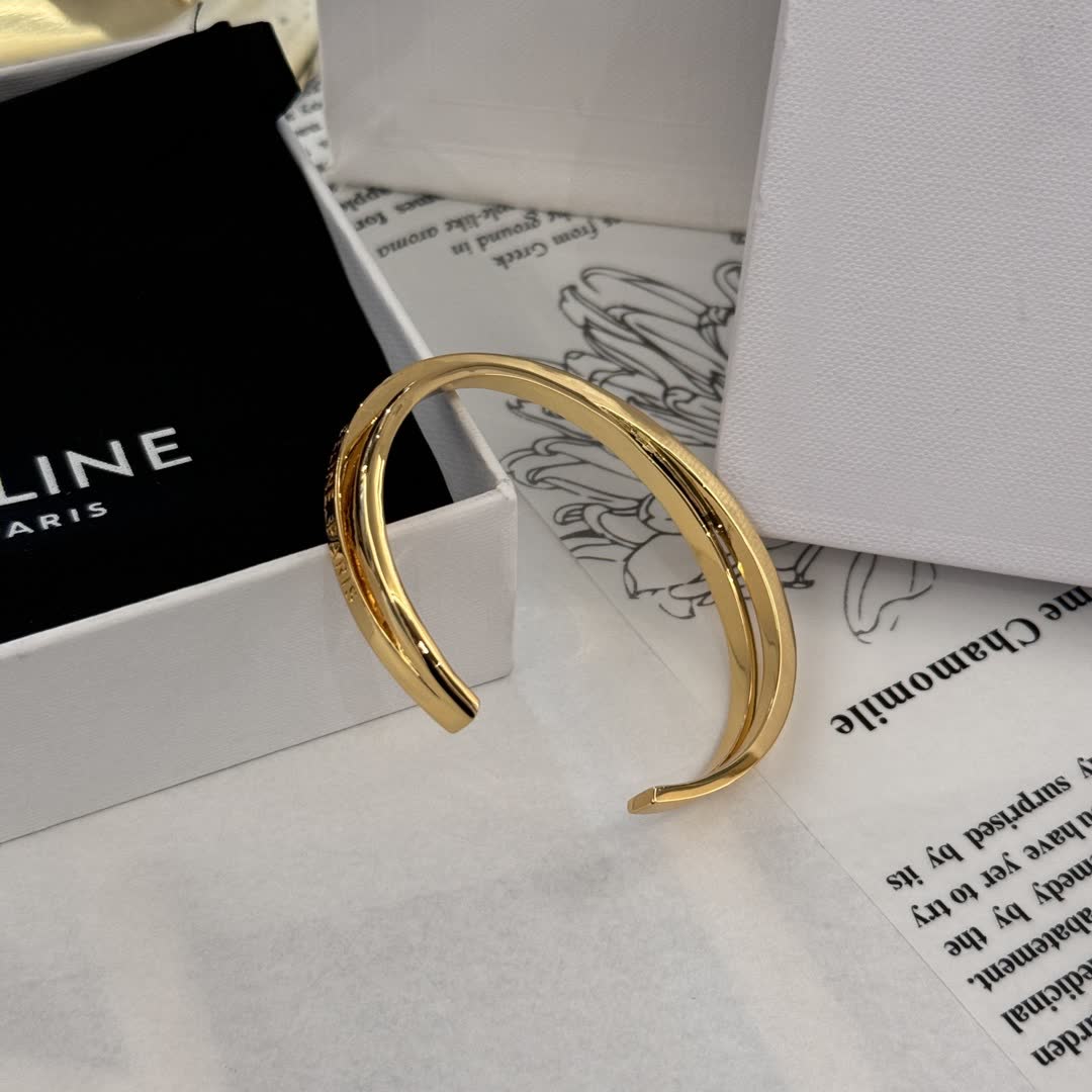 Celine Gold Tone Engraved Bracelet