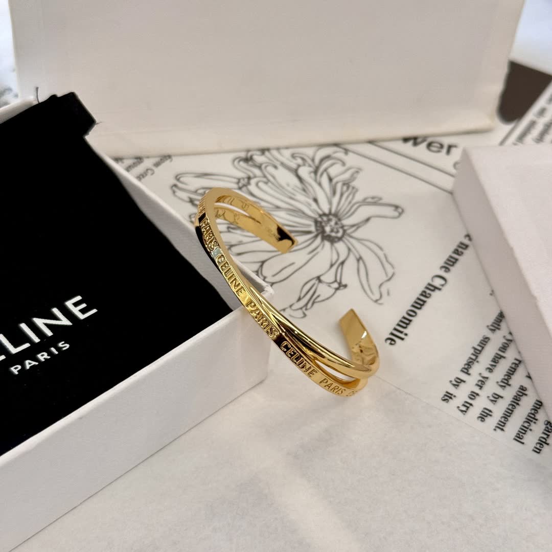 Celine Gold Tone Engraved Bracelet