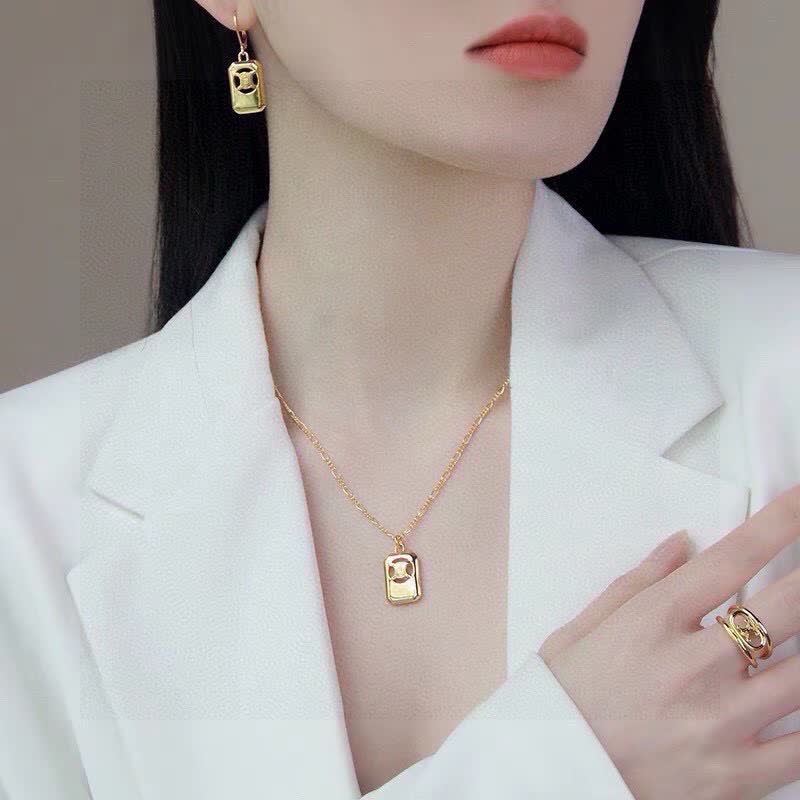 Celine Paris Gold Tone Logo Earrings