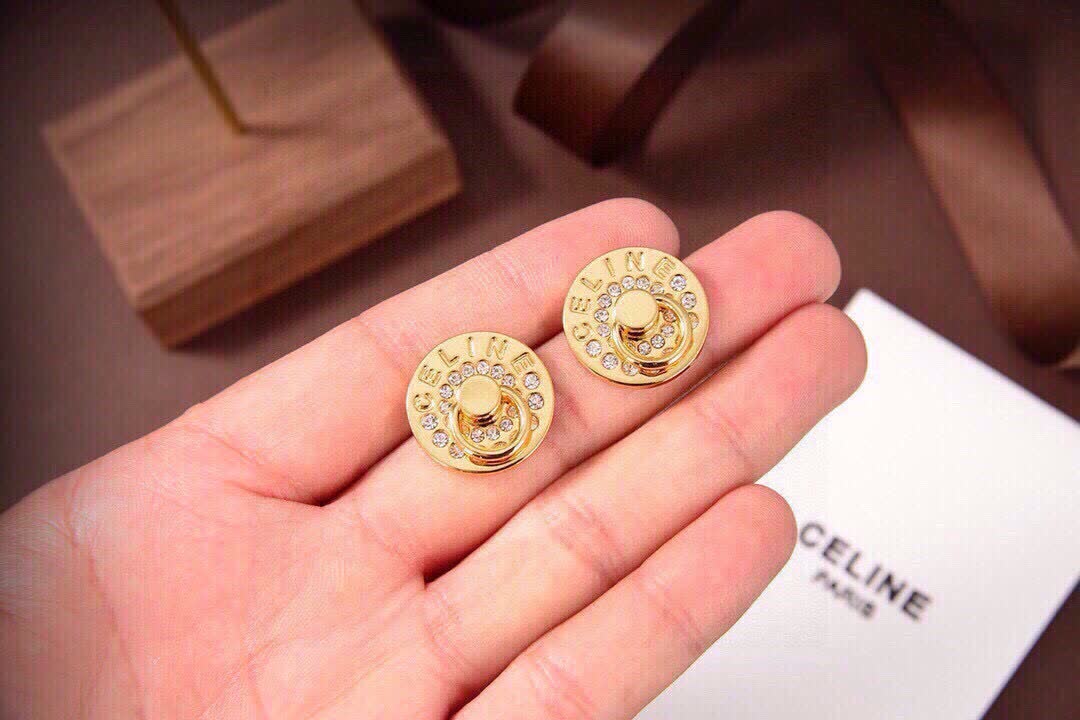 Celine Paris Gold Tone Stud Earrings with Crystal Accents