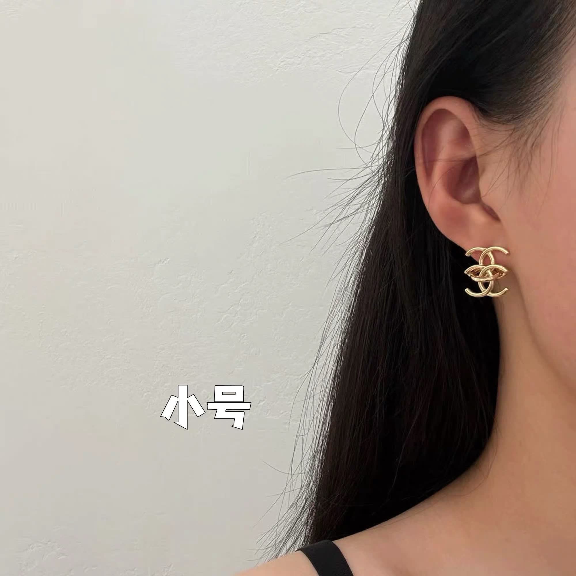 Chanel CC Logo Gold Tone Stud Earrings