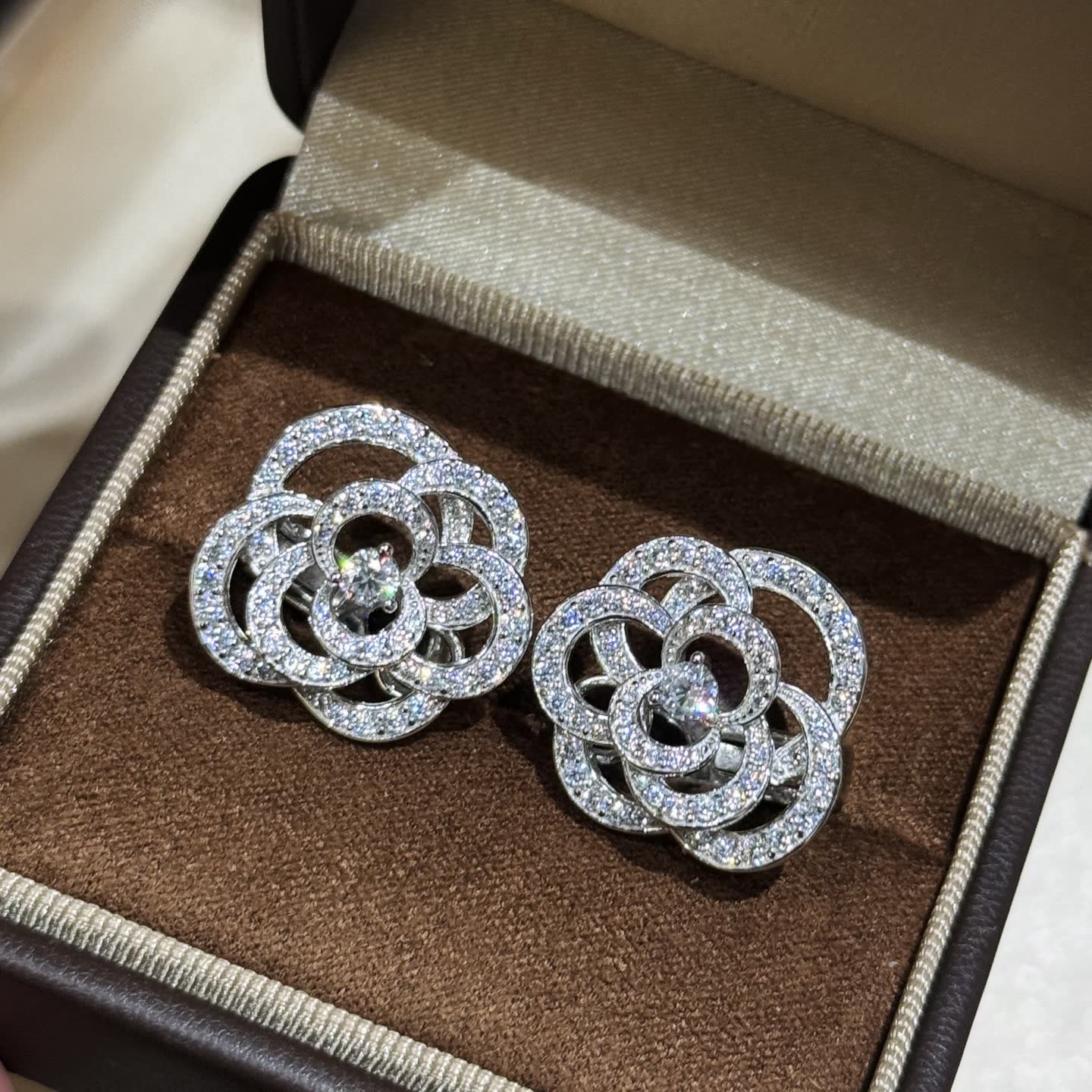 Elegant Silver Flower Stud Earrings with Diamond Accents Elegant Silver Flower Stud Earrings with Diamond Accents