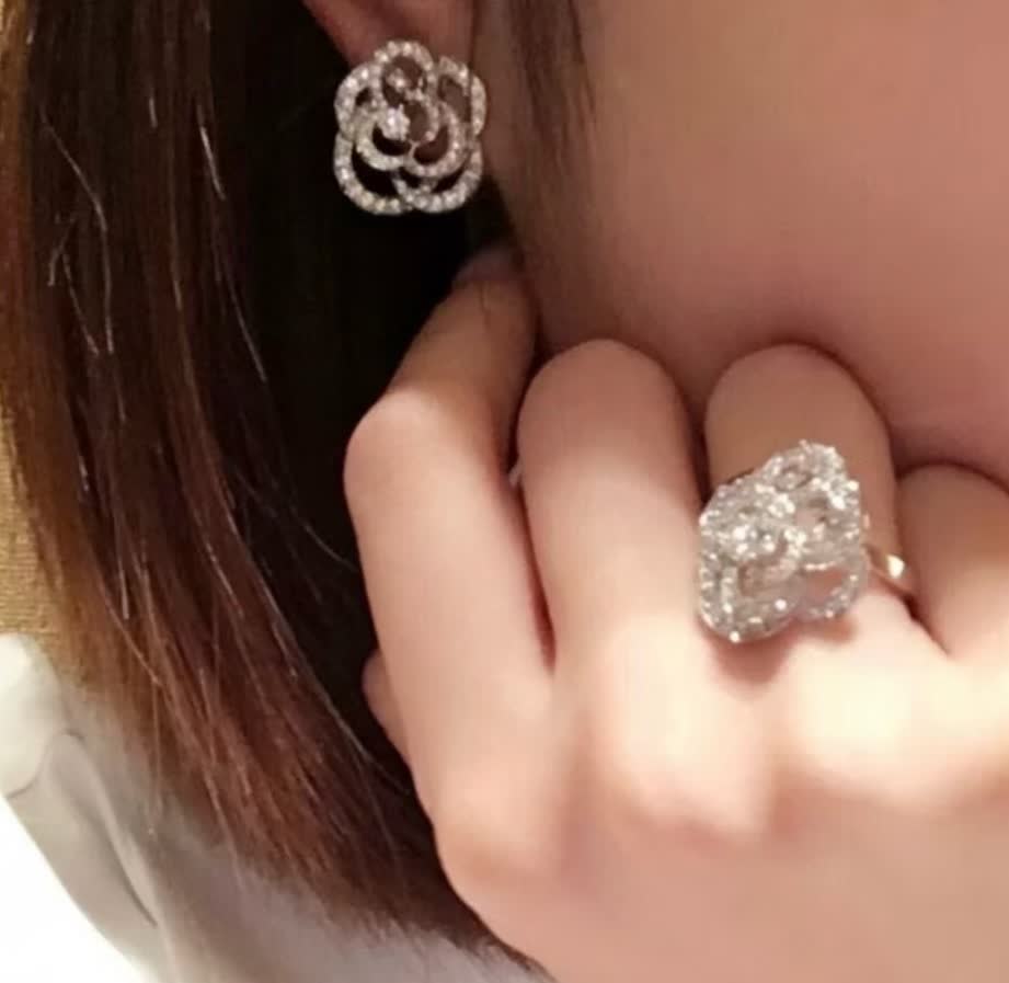 Elegant Silver Flower Stud Earrings with Diamond Accents