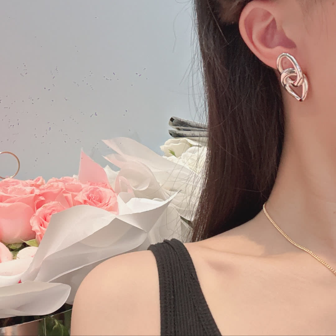 Chanel Silver Interlocking Heart Earrings Chanel Silver Interlocking Heart Earrings