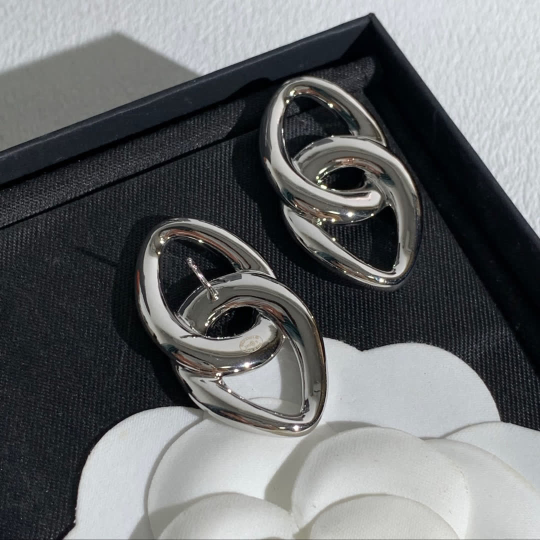 Chanel Silver Interlocking Heart Earrings