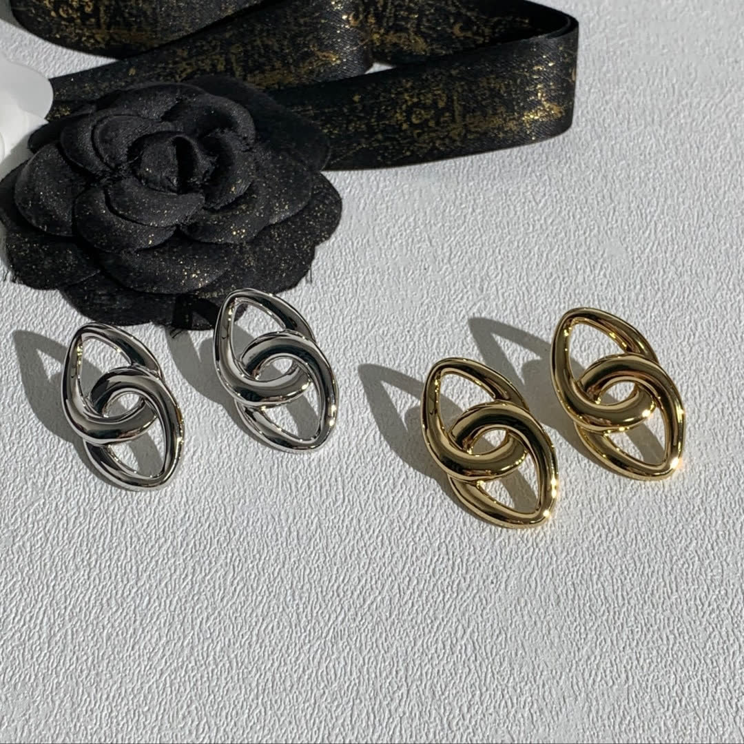Chanel Silver Interlocking Heart Earrings