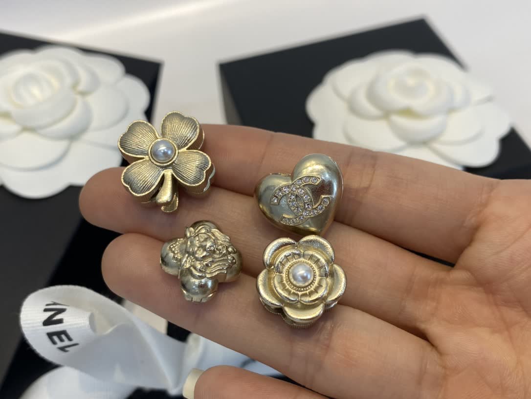 Chanel Gold Tone Flower and Heart Stud Earrings Chanel Gold Tone Flower and Heart Stud Earrings