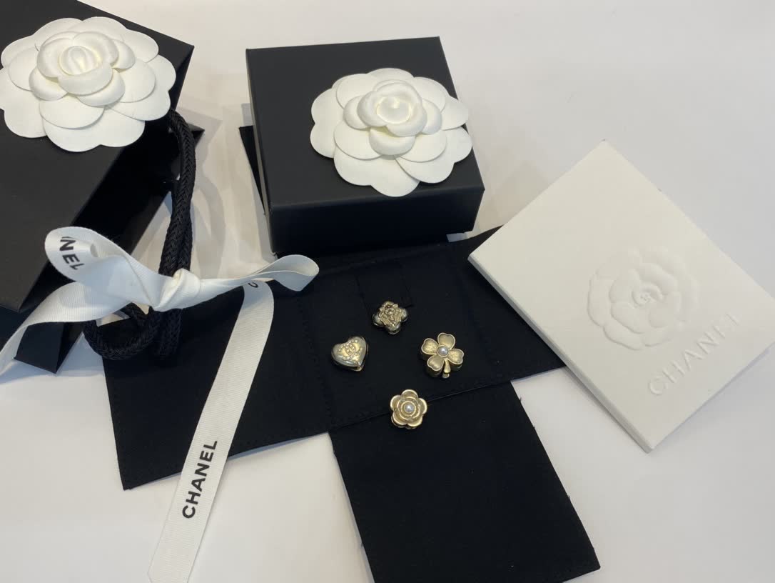 Chanel Gold Tone Flower and Heart Stud Earrings