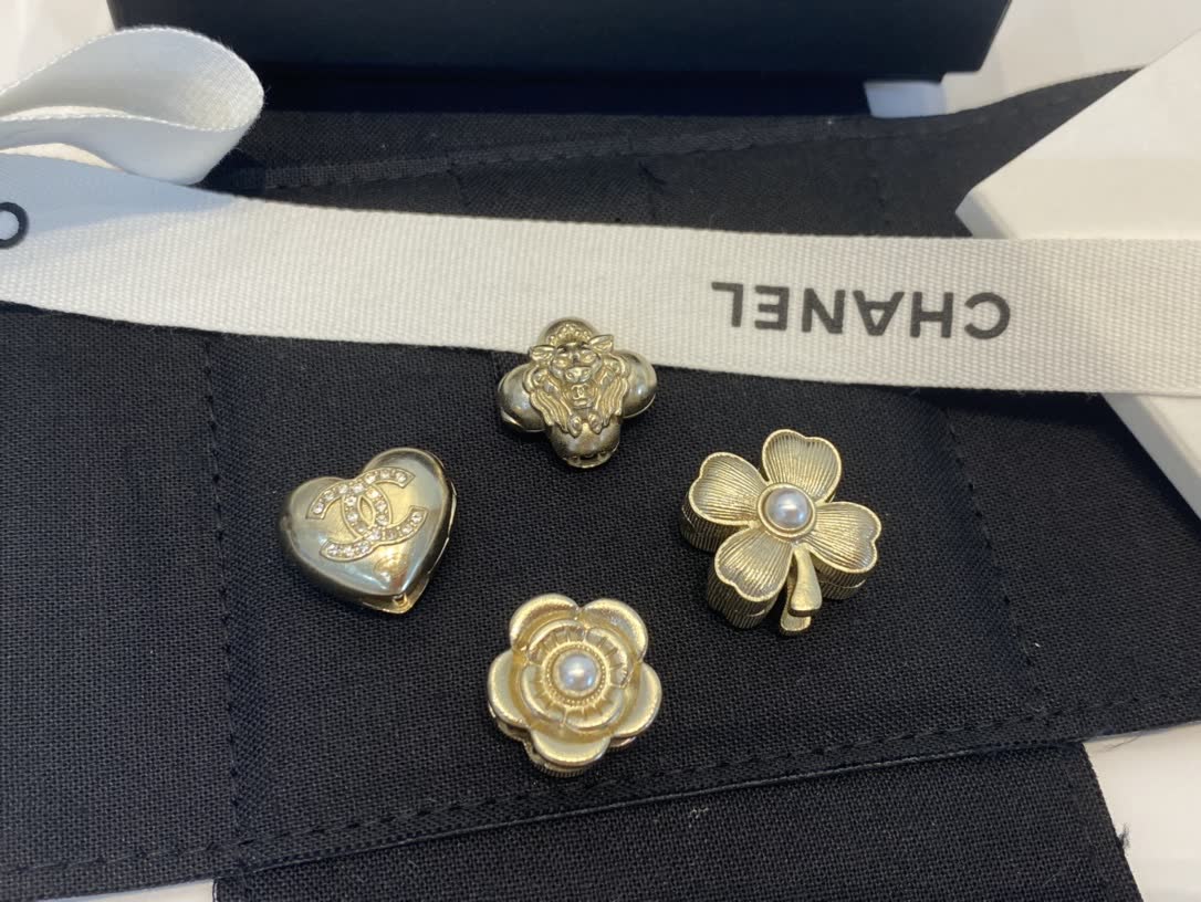 Chanel Gold Tone Flower and Heart Stud Earrings