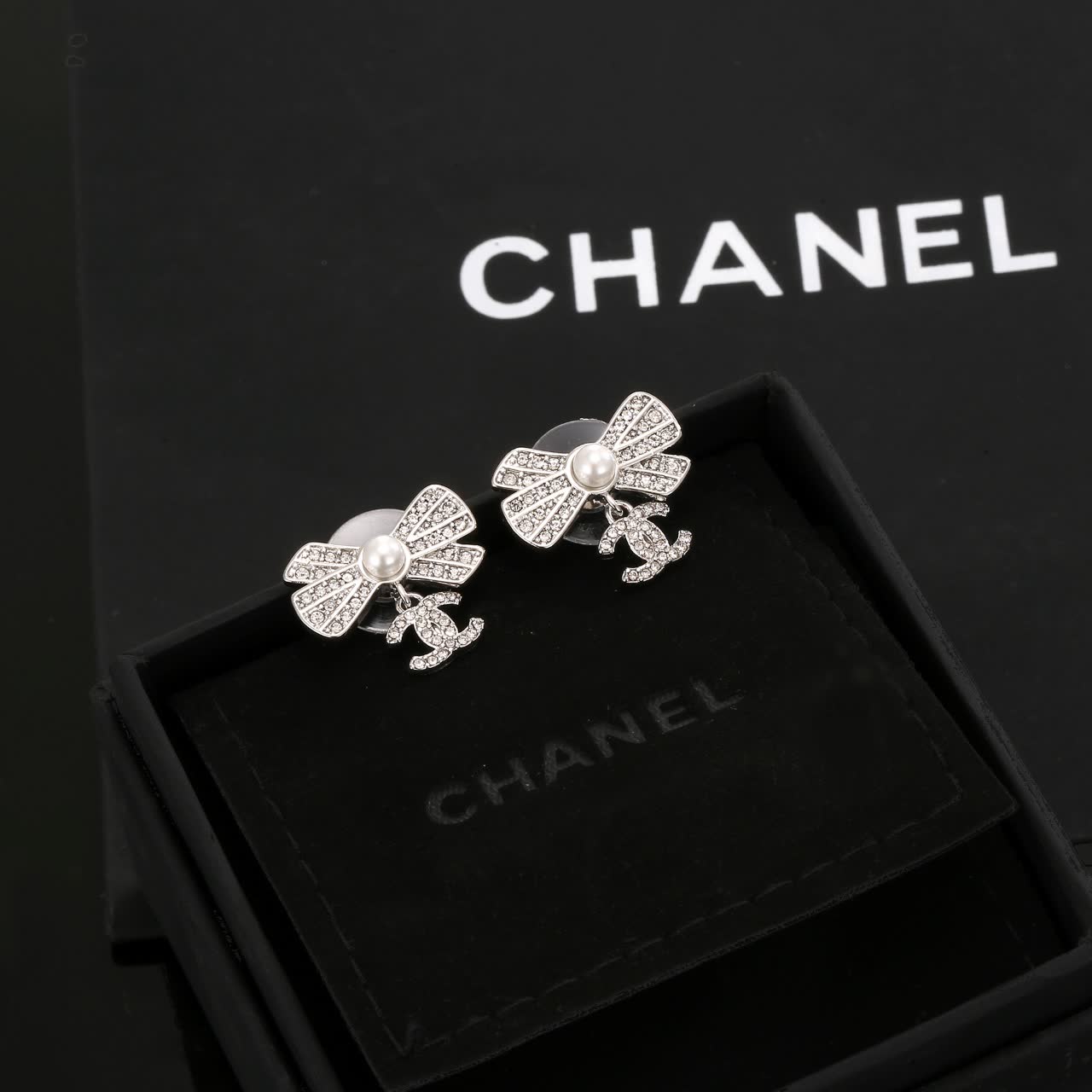 Chanel Silver Bow Earrings with Pearls and CC Logo Chanel Silver Bow Earrings with Pearls and CC Logo