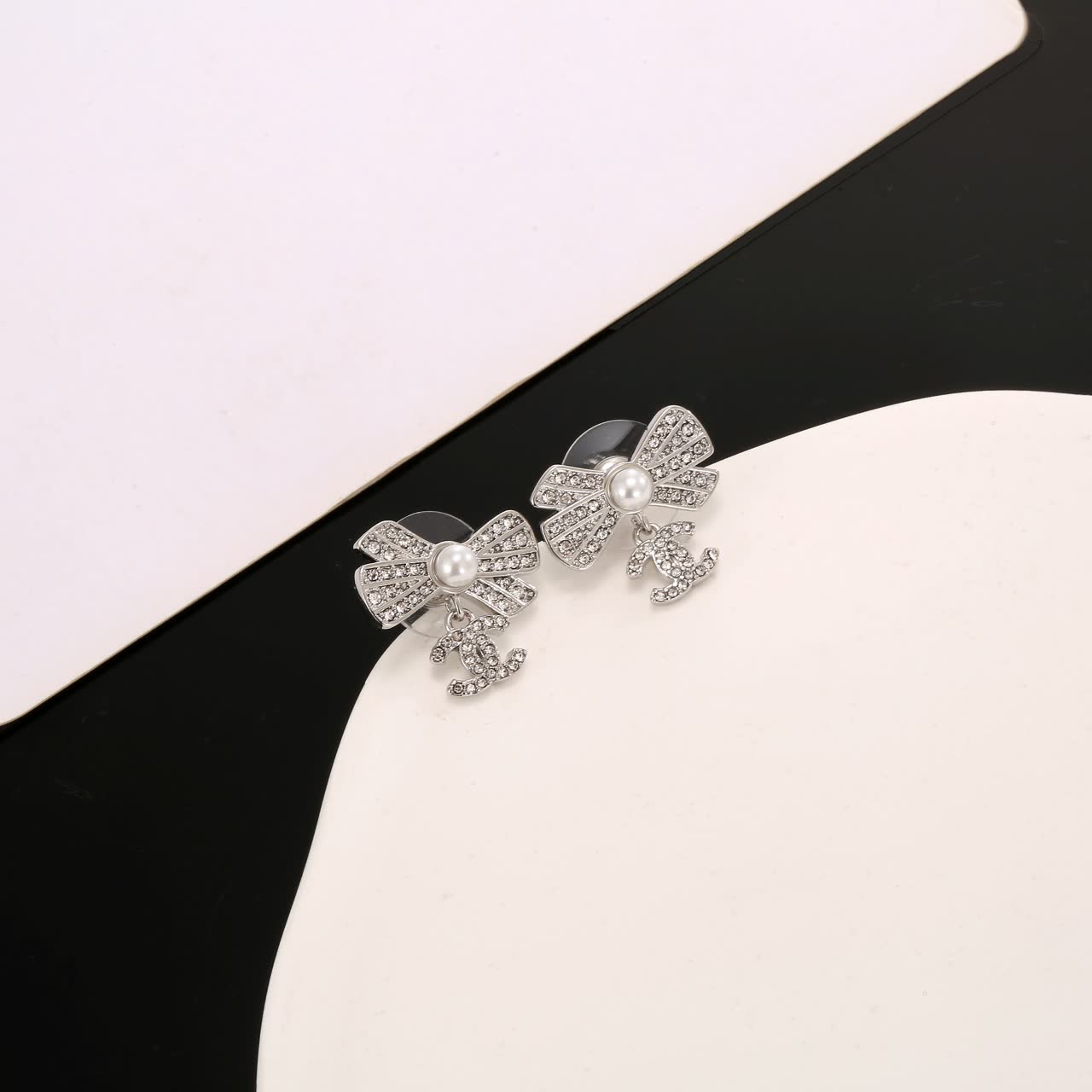 Chanel Silver Bow Earrings with Pearls and CC Logo