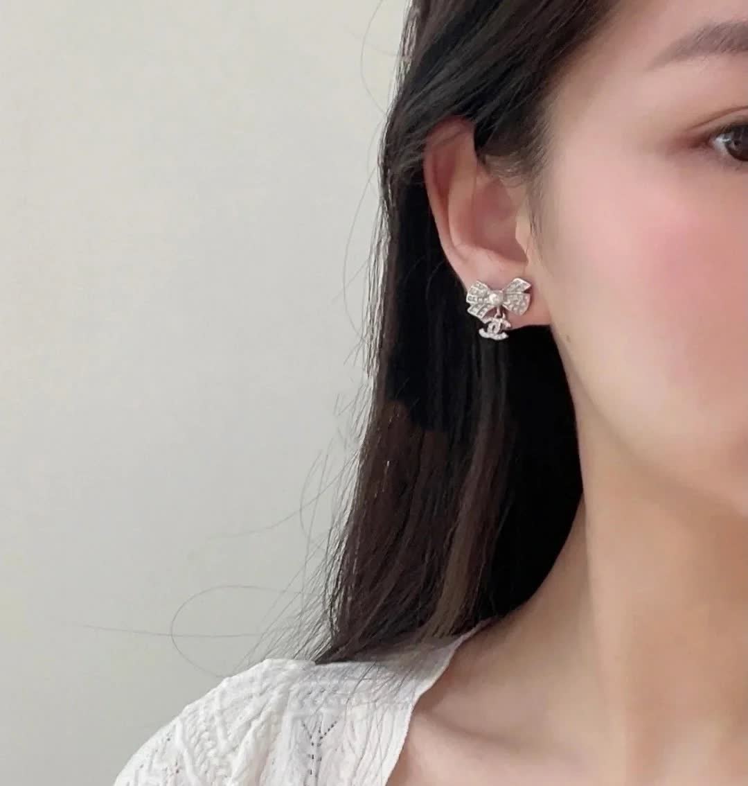 Chanel Silver Bow Earrings with Pearls and CC Logo