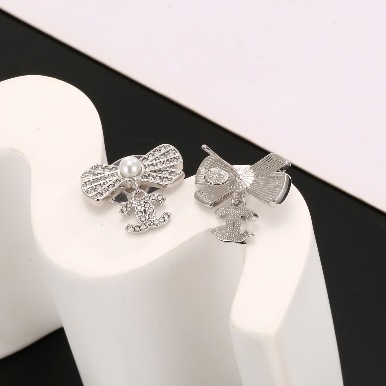 Chanel Silver Bow Earrings with Pearls and CC Logo