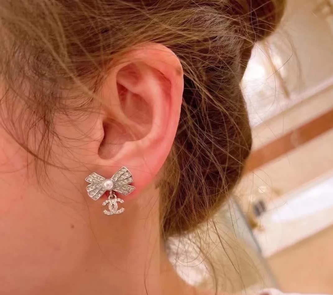 Chanel Silver Bow Earrings with Pearls and CC Logo