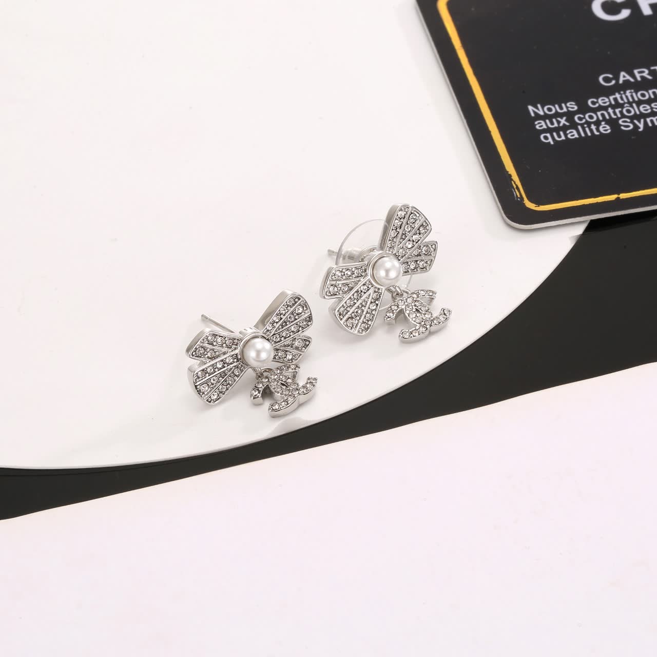 Chanel Silver Bow Earrings with Pearls and CC Logo