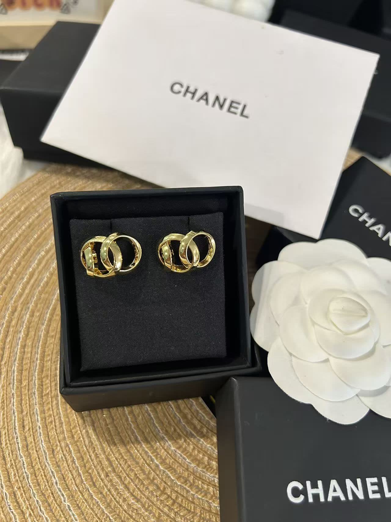 Chanel Gold Tone Interlocking Ring Earrings