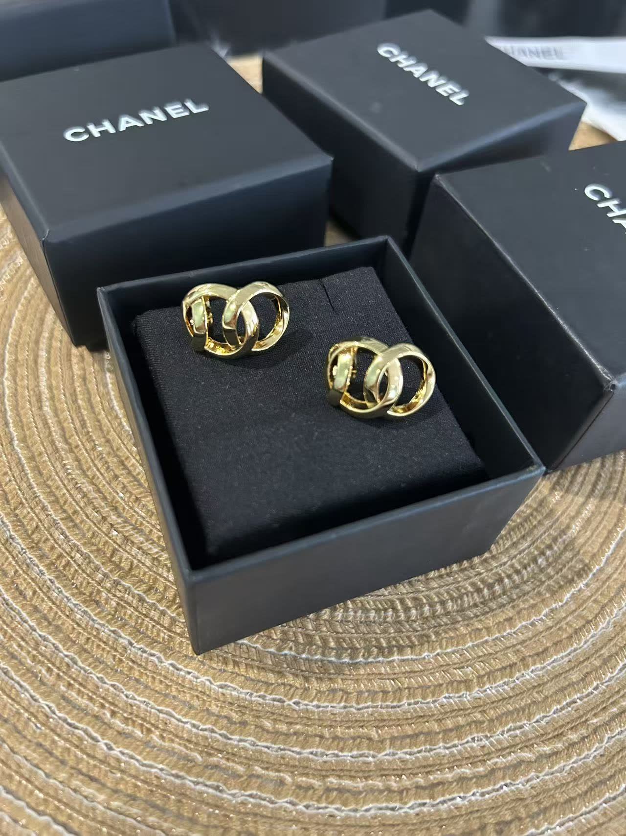 Chanel Gold Tone Interlocking Ring Earrings
