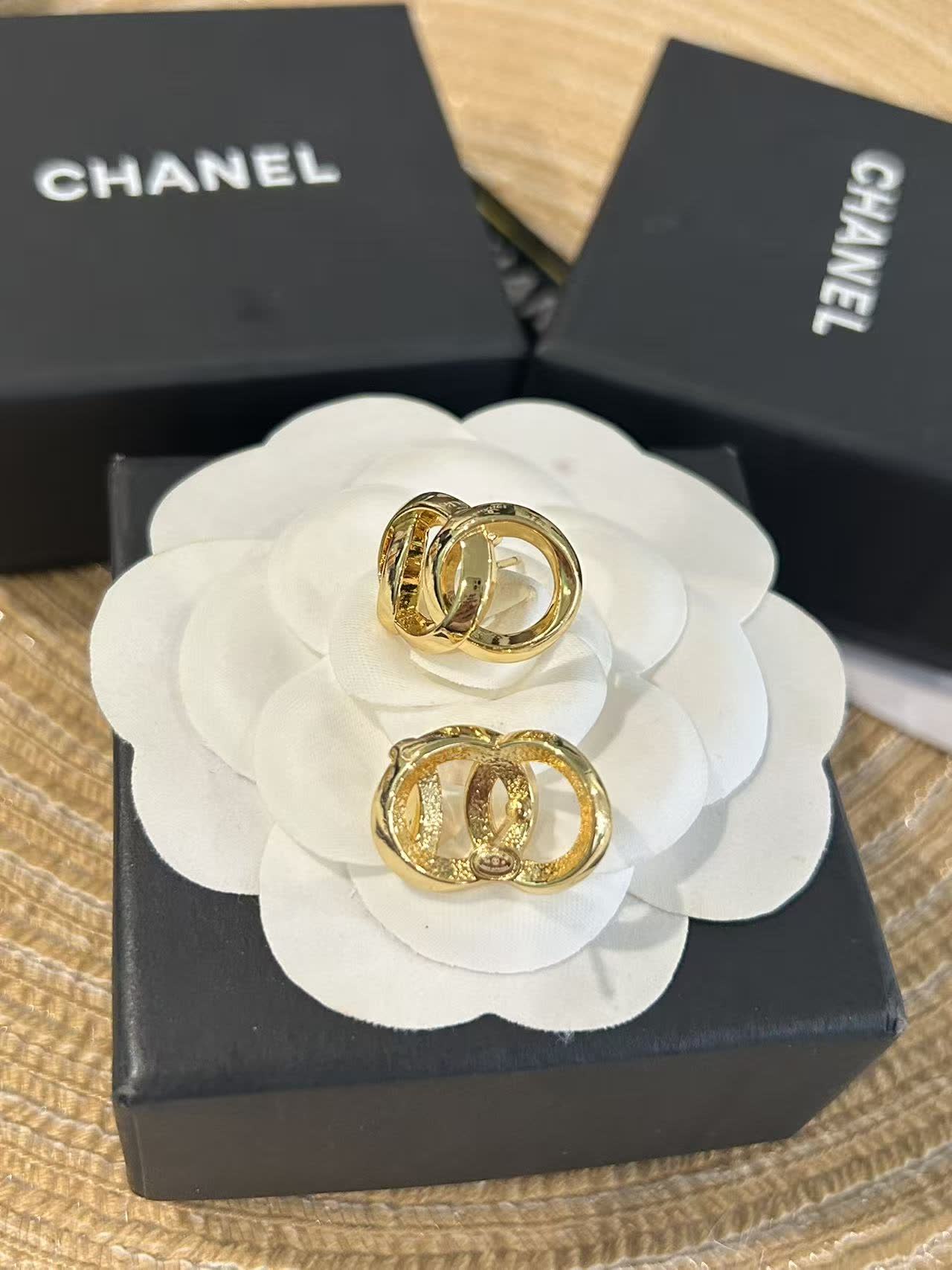 Chanel Gold Tone Interlocking Ring Earrings