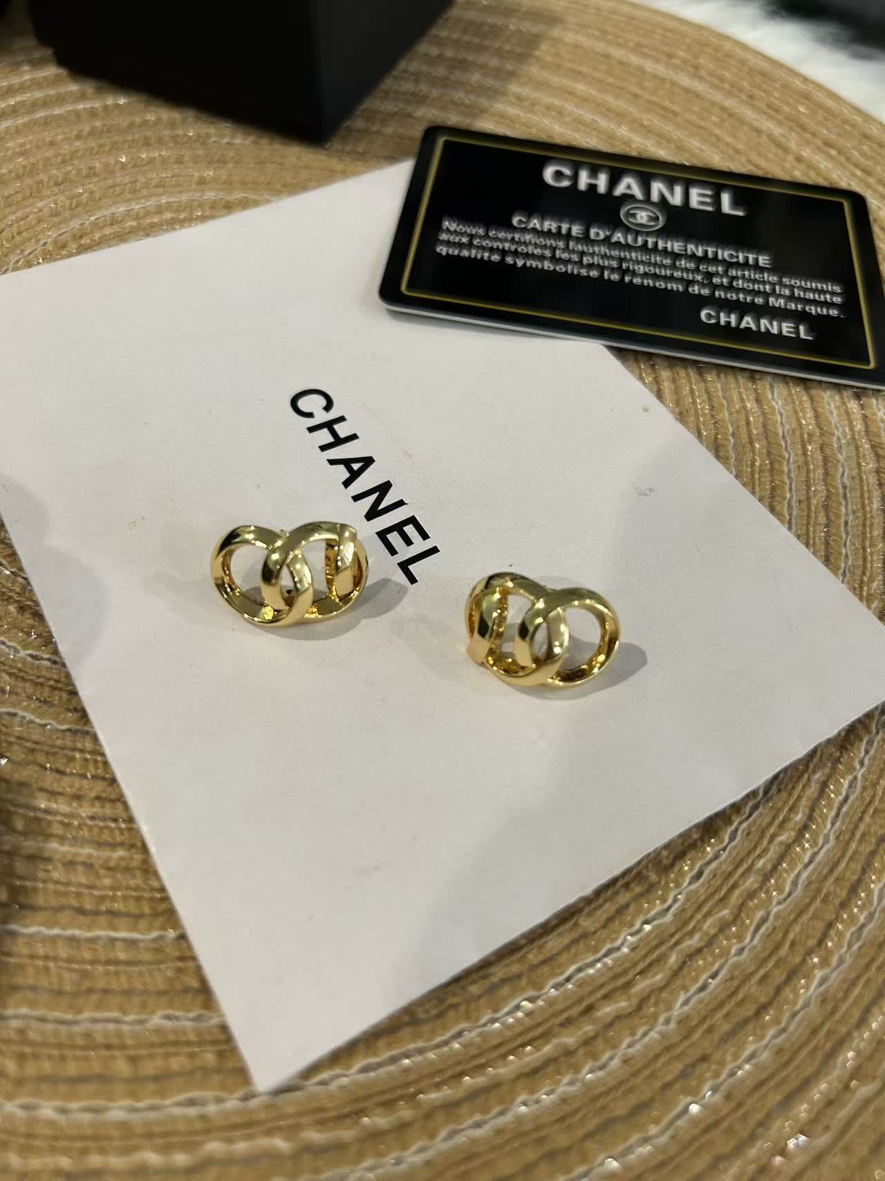 Chanel Gold Tone Interlocking Ring Earrings