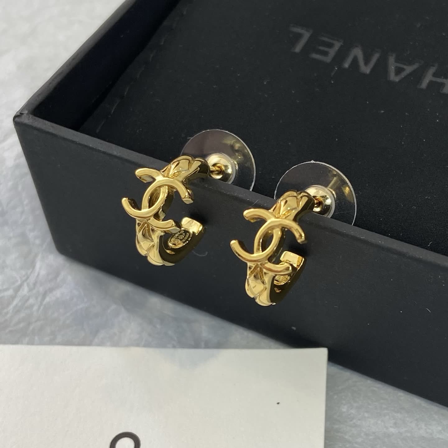 Chanel CC Logo Gold Tone Stud Earrings