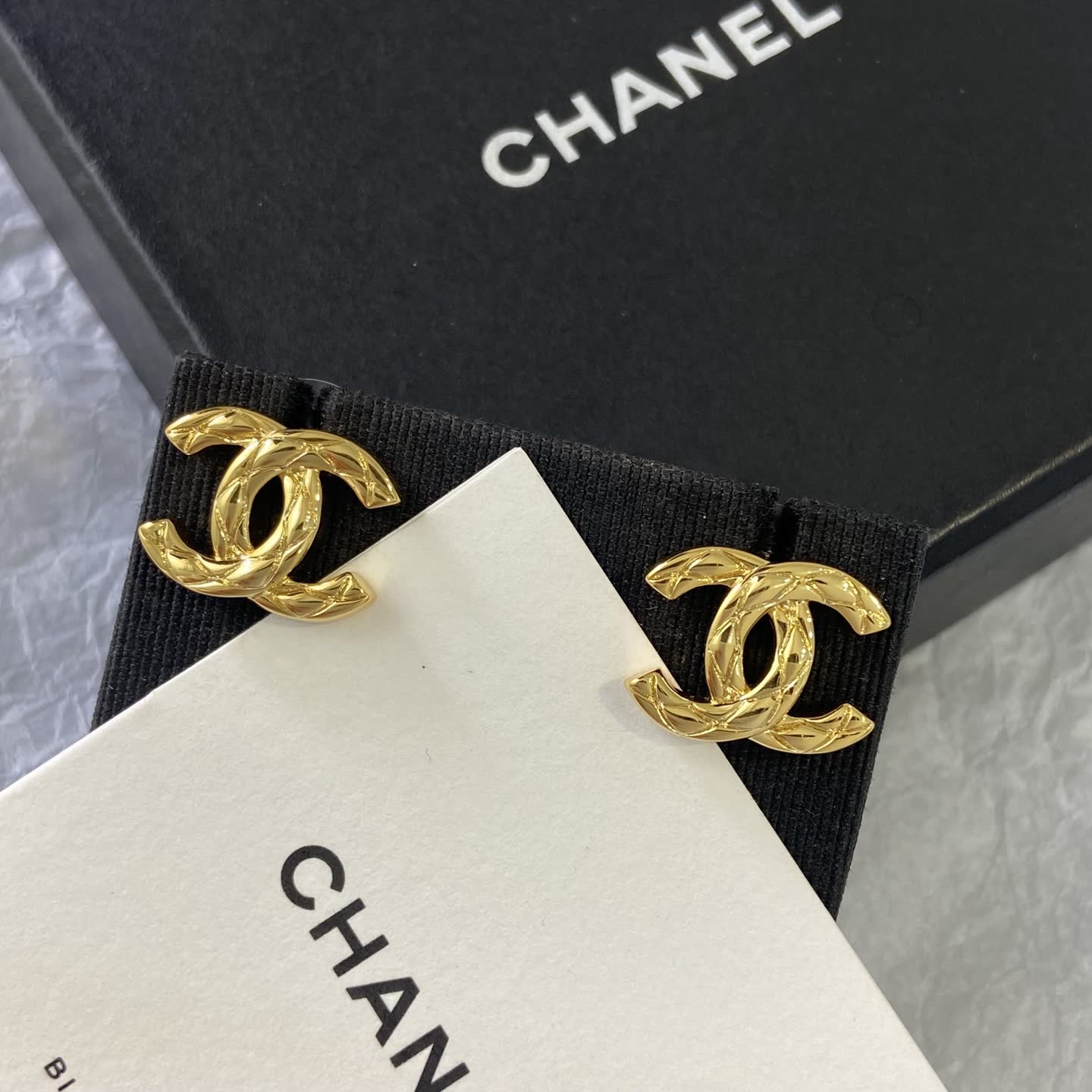 Chanel CC Logo Gold Tone Stud Earrings