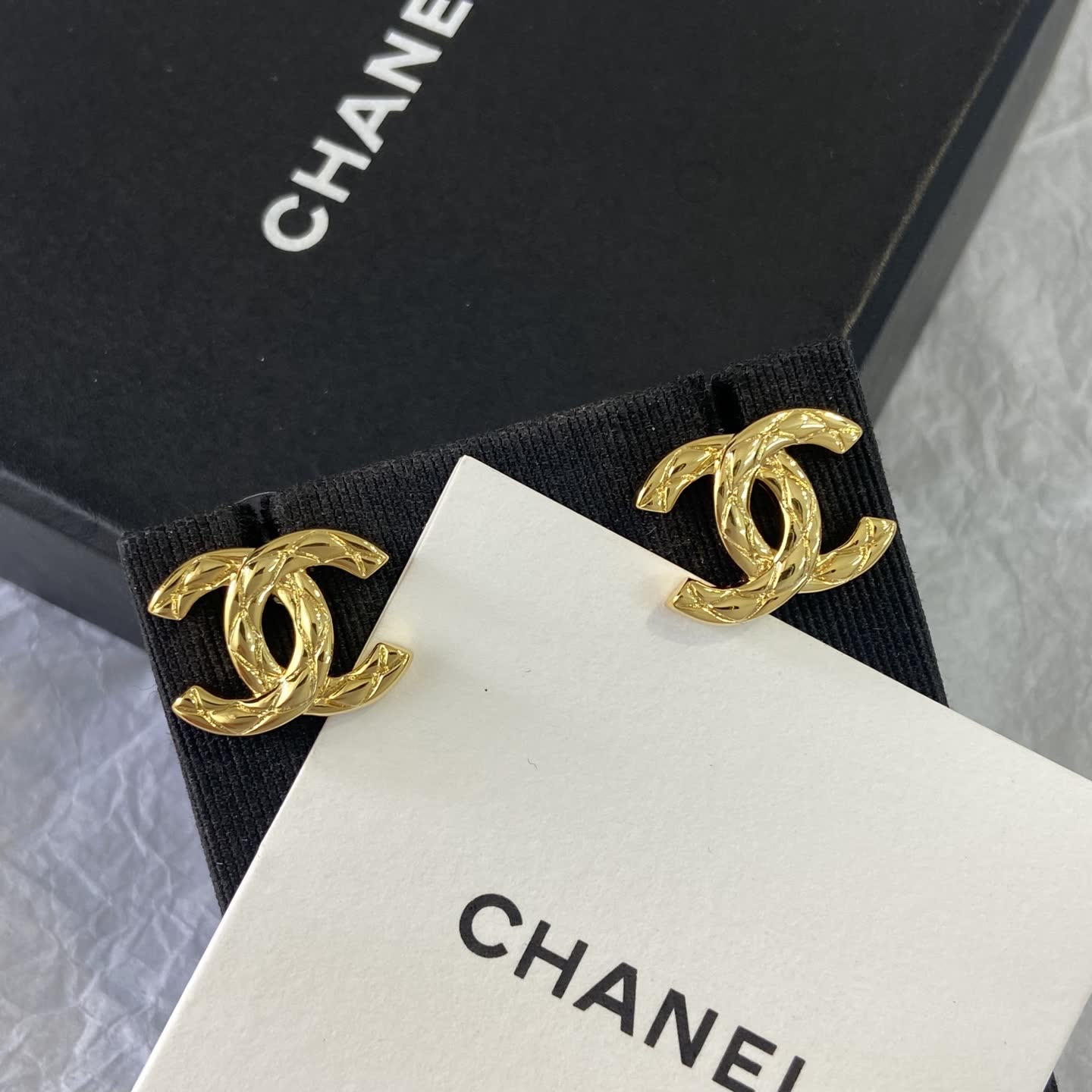 Chanel CC Logo Gold Tone Stud Earrings