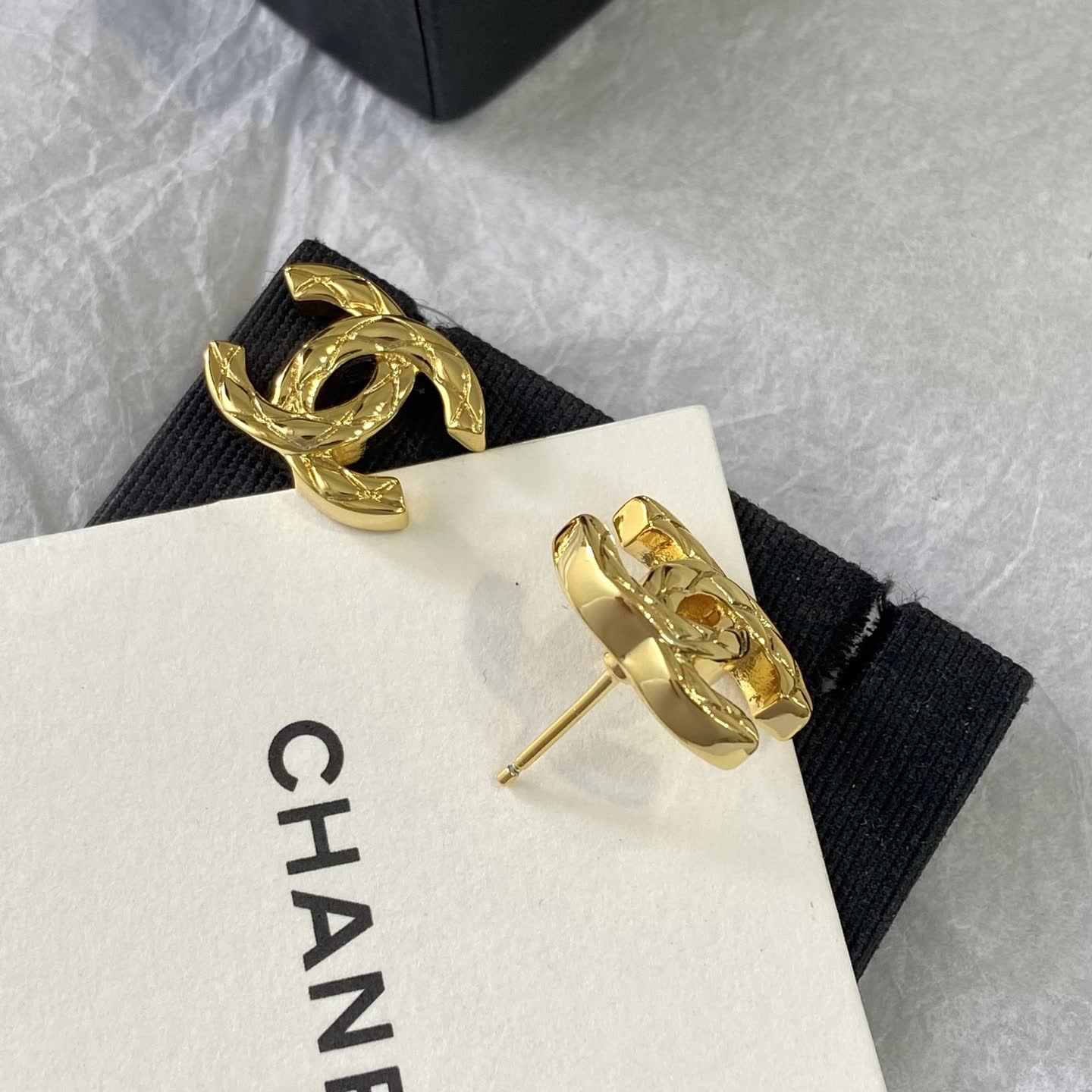 Chanel CC Logo Gold Tone Stud Earrings