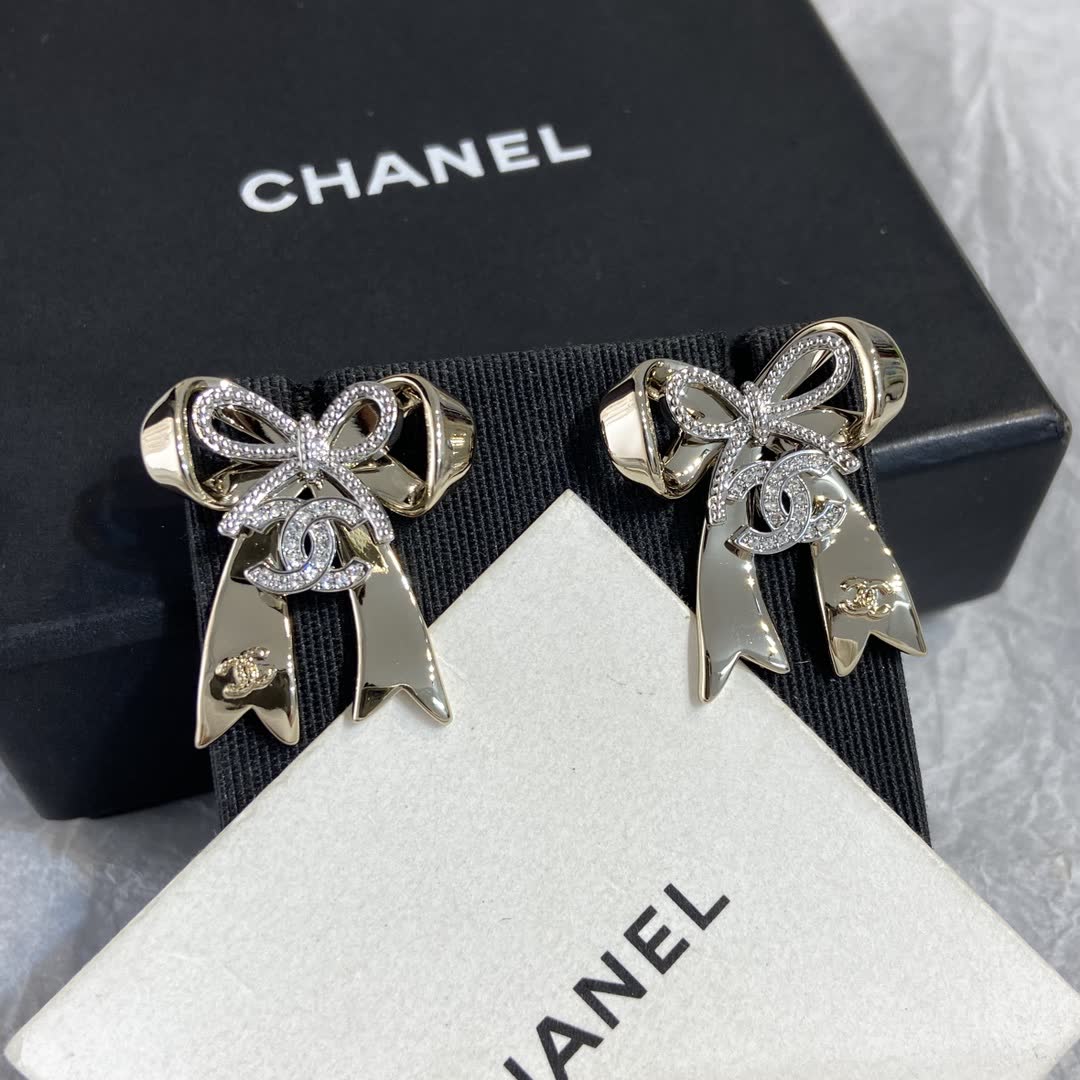 Chanel Gold Tone Bow Earrings Chanel Gold Tone Bow Earrings