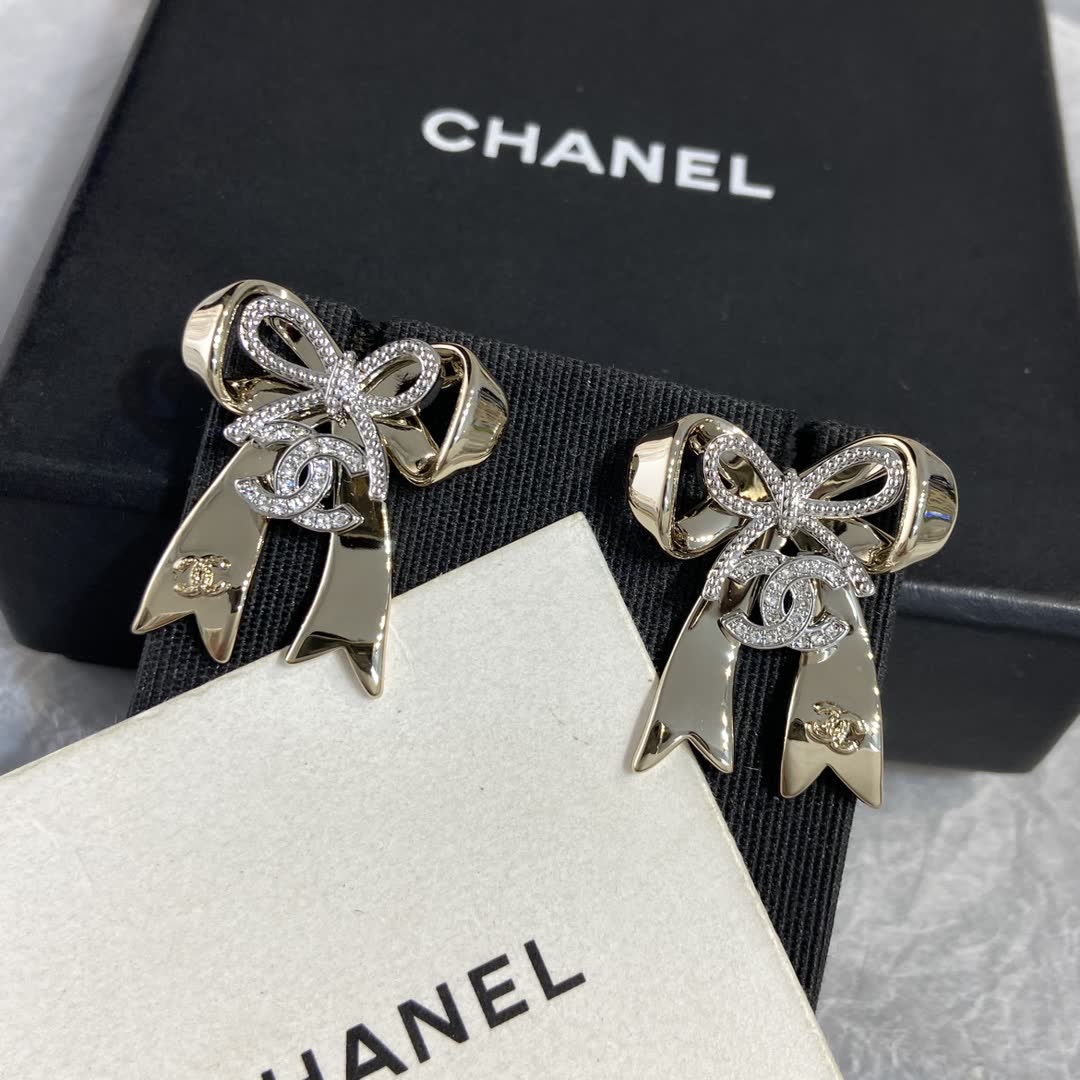 Chanel Gold Tone Bow Earrings