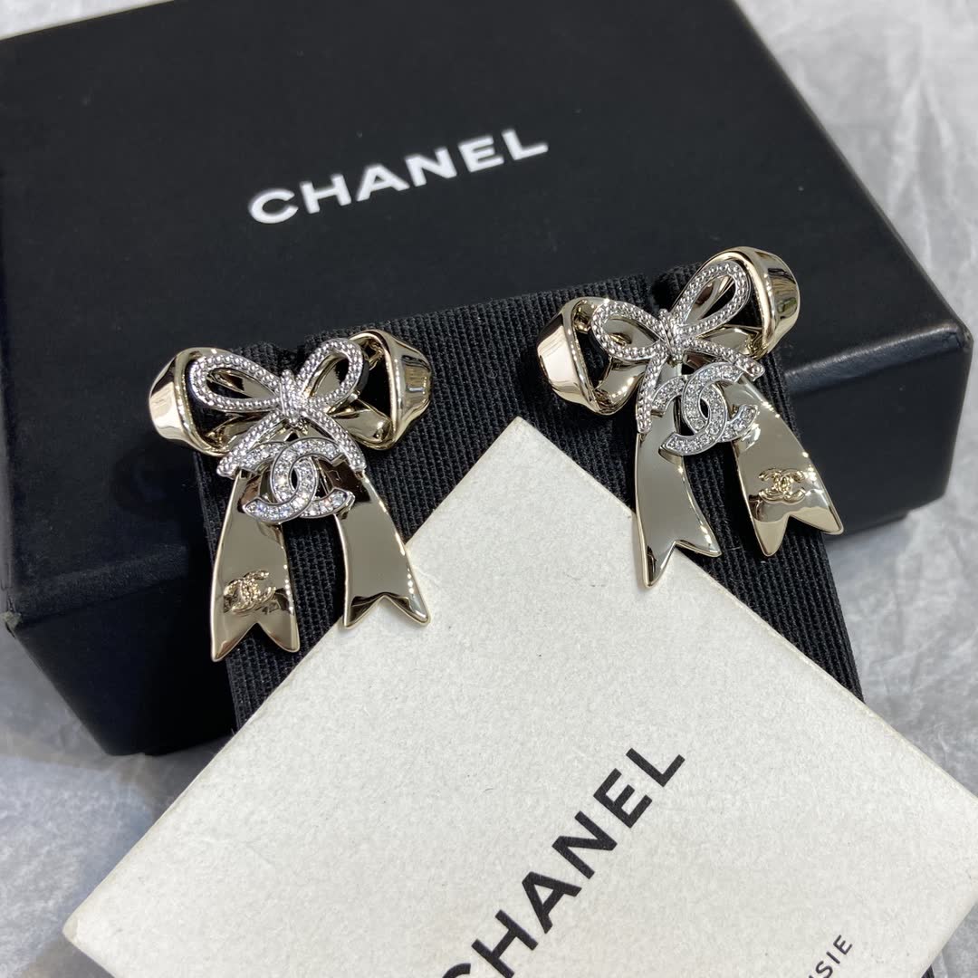 Chanel Gold Tone Bow Earrings