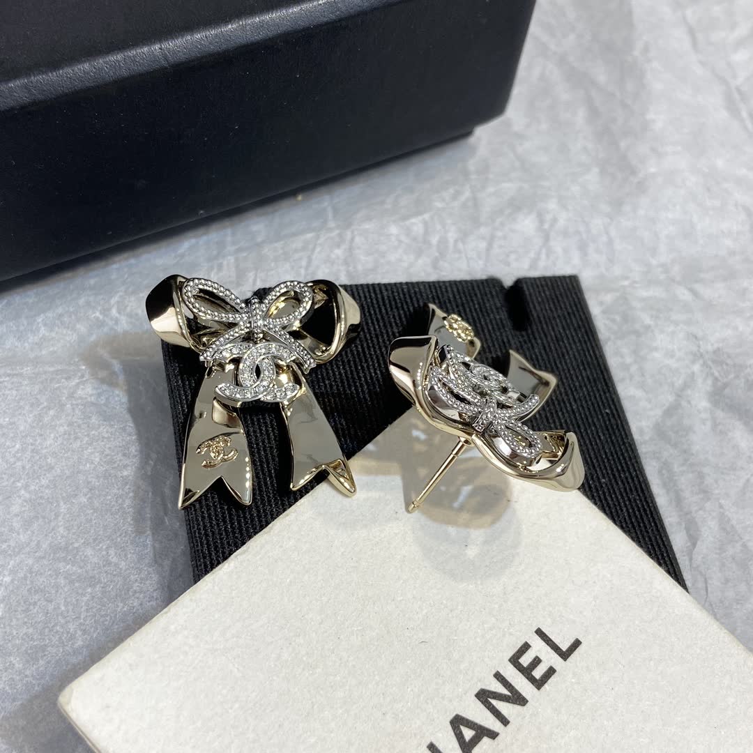 Chanel Gold Tone Bow Earrings
