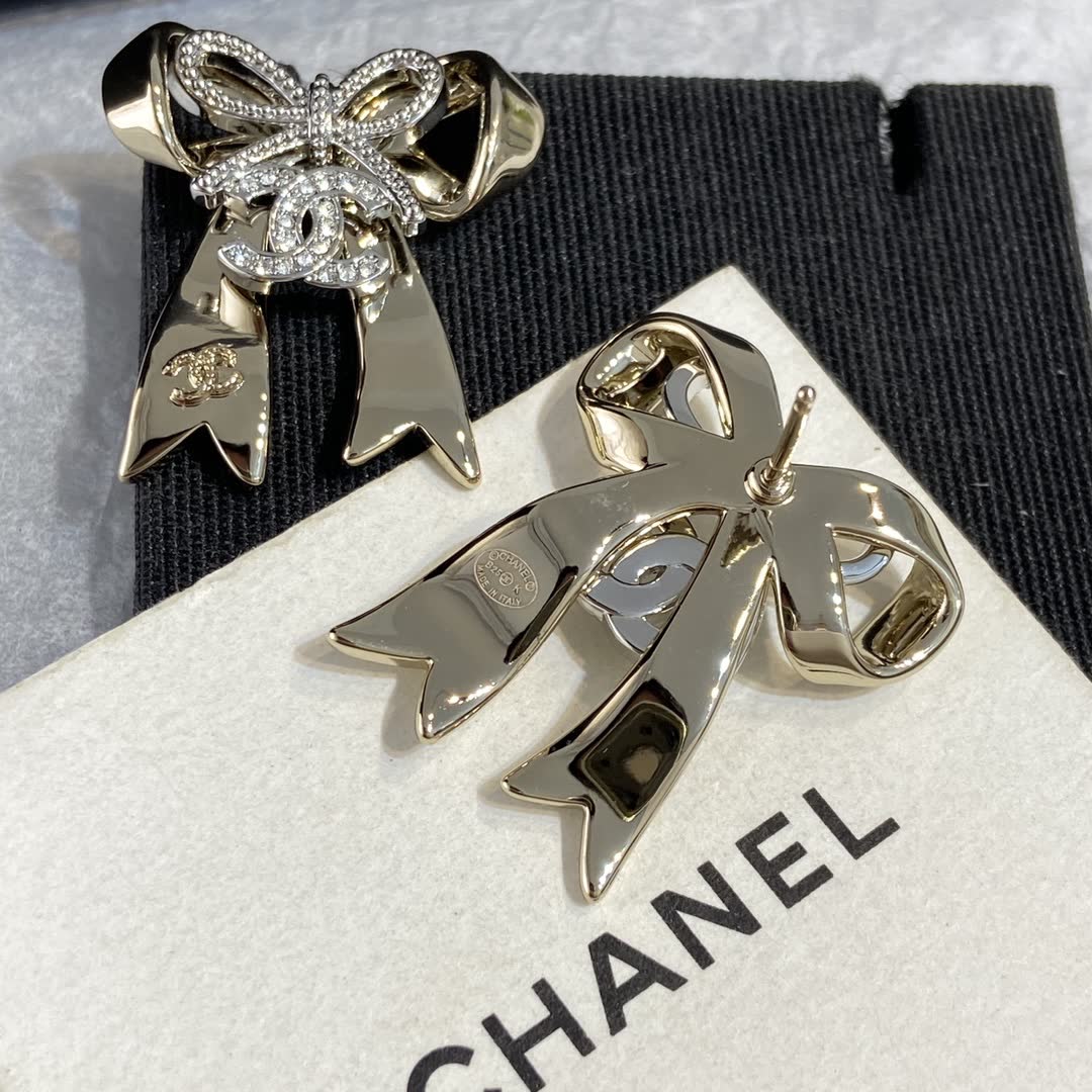 Chanel Gold Tone Bow Earrings