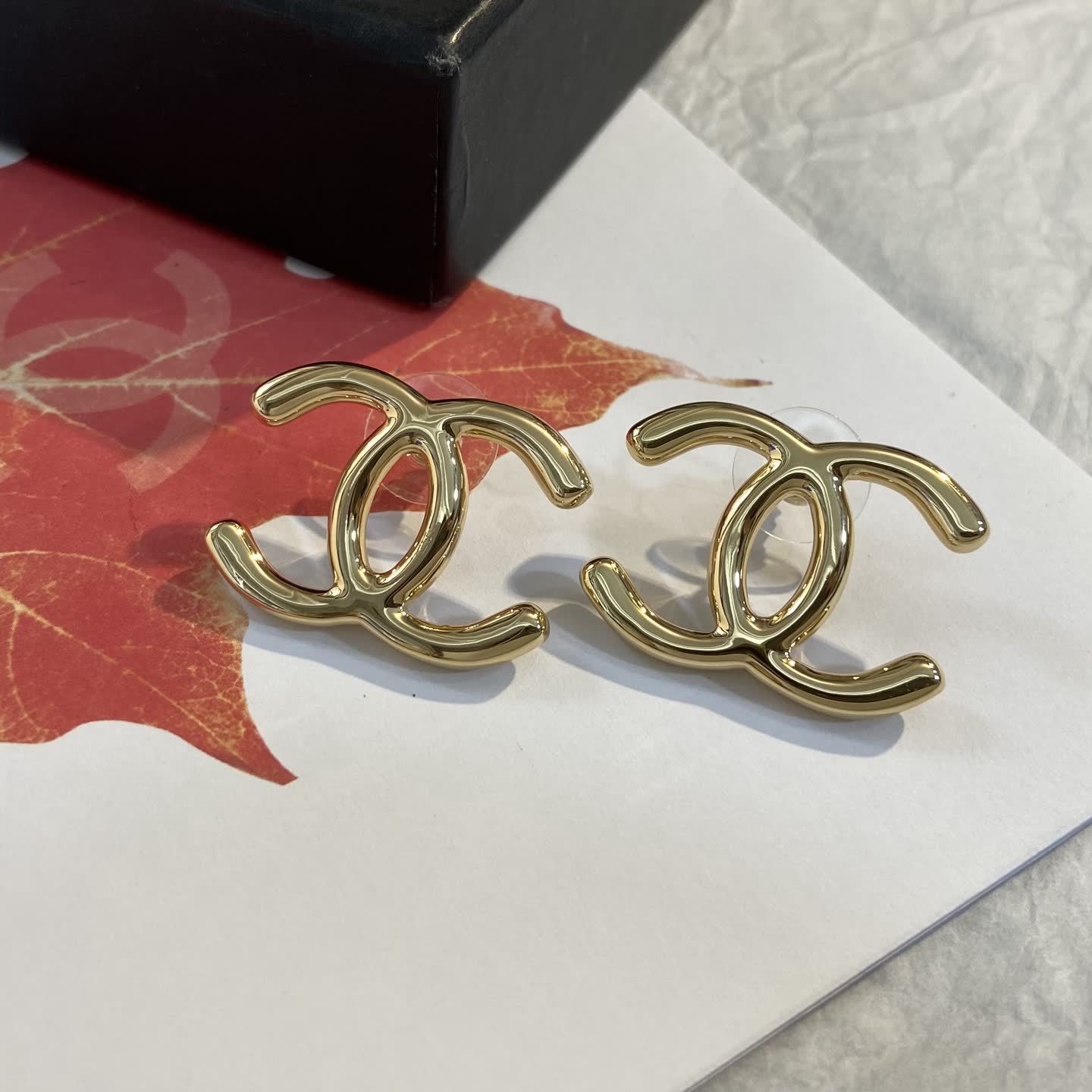 Chanel CC Logo Gold Tone Stud Earrings