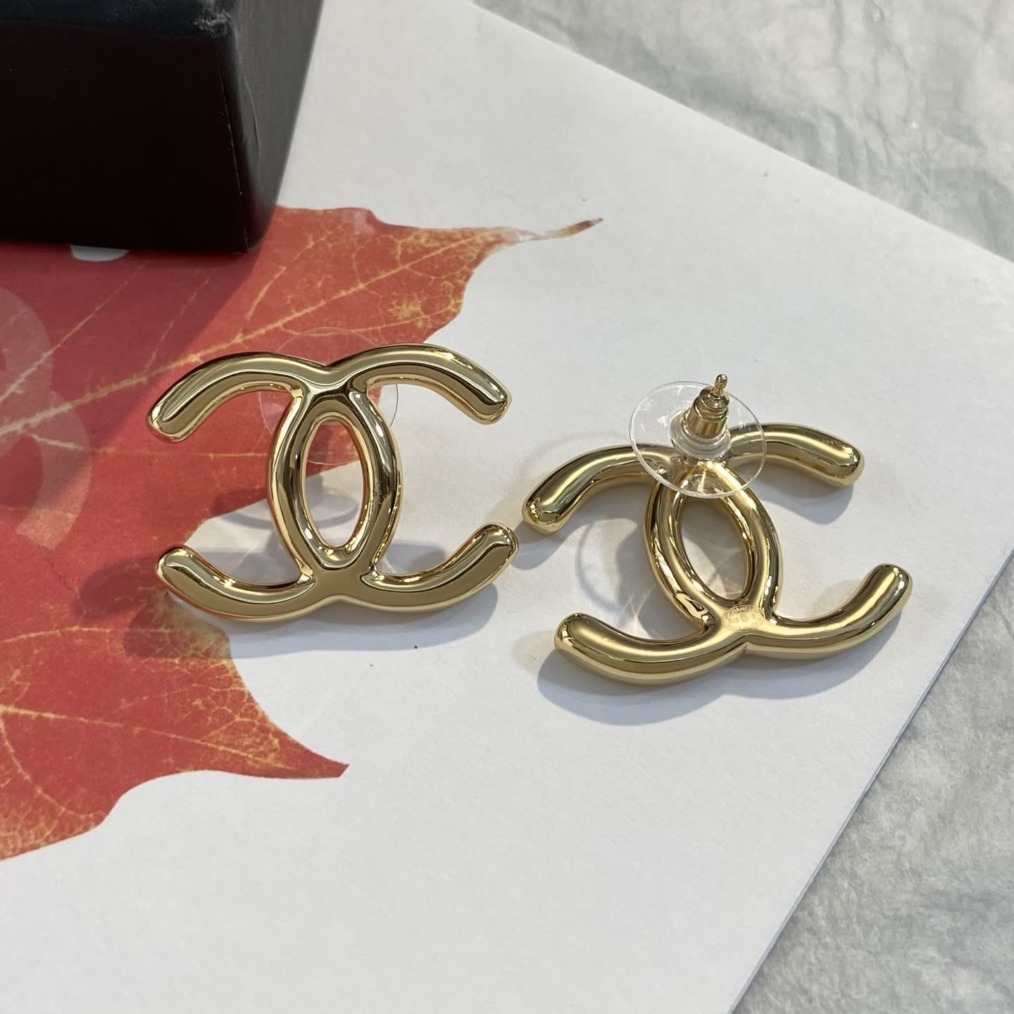 Chanel CC Logo Gold Tone Stud Earrings