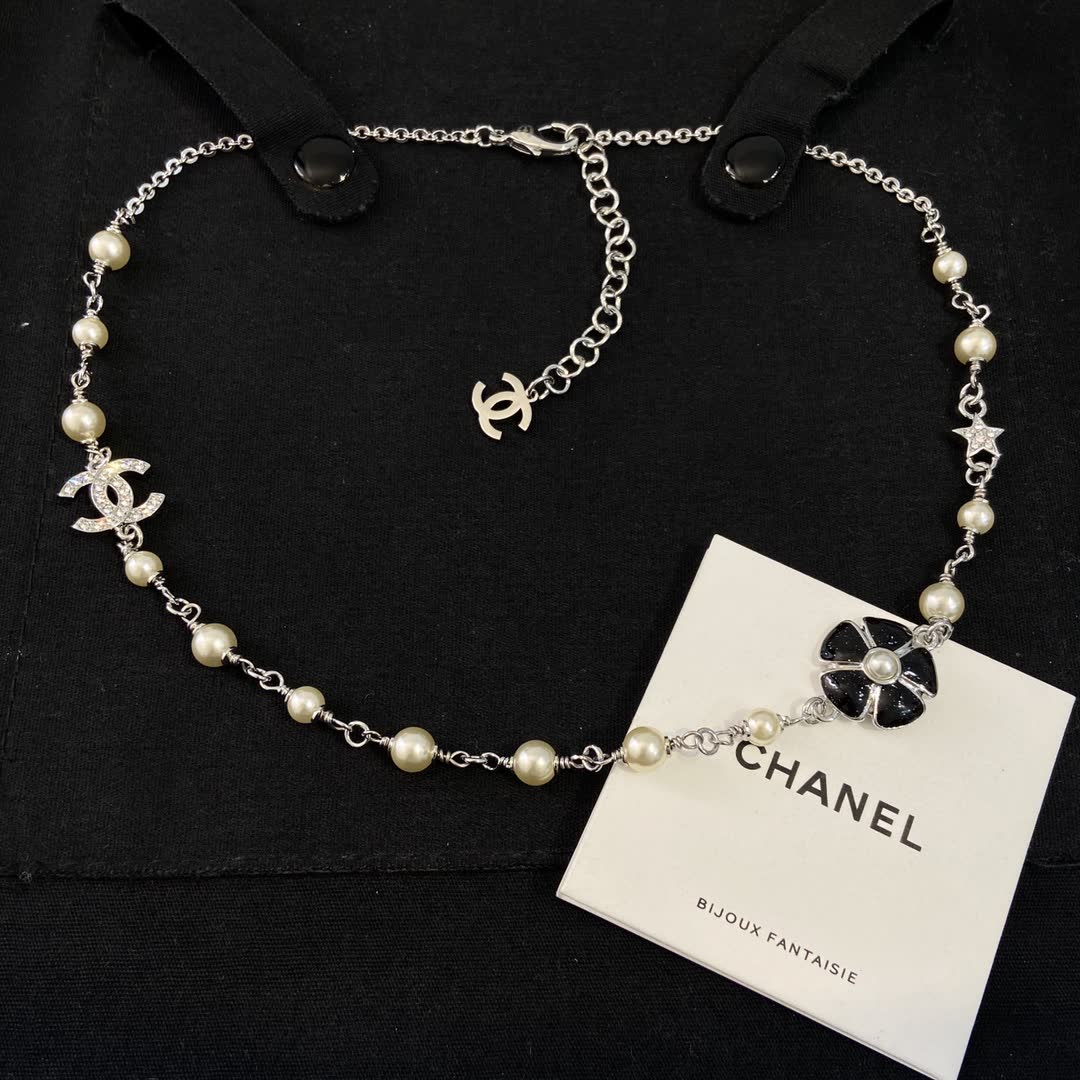 Chanel Pearl and CC Logo Necklace Chanel Pearl and CC Logo Necklace
