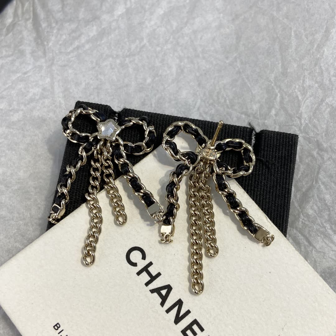 Chanel Black and Gold Chain Bow Earrings